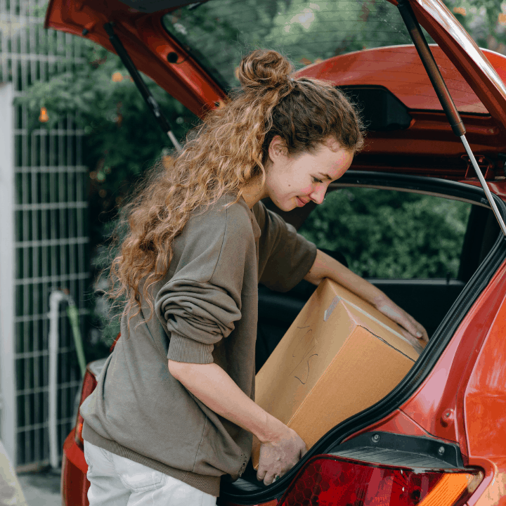 putting boxes in car